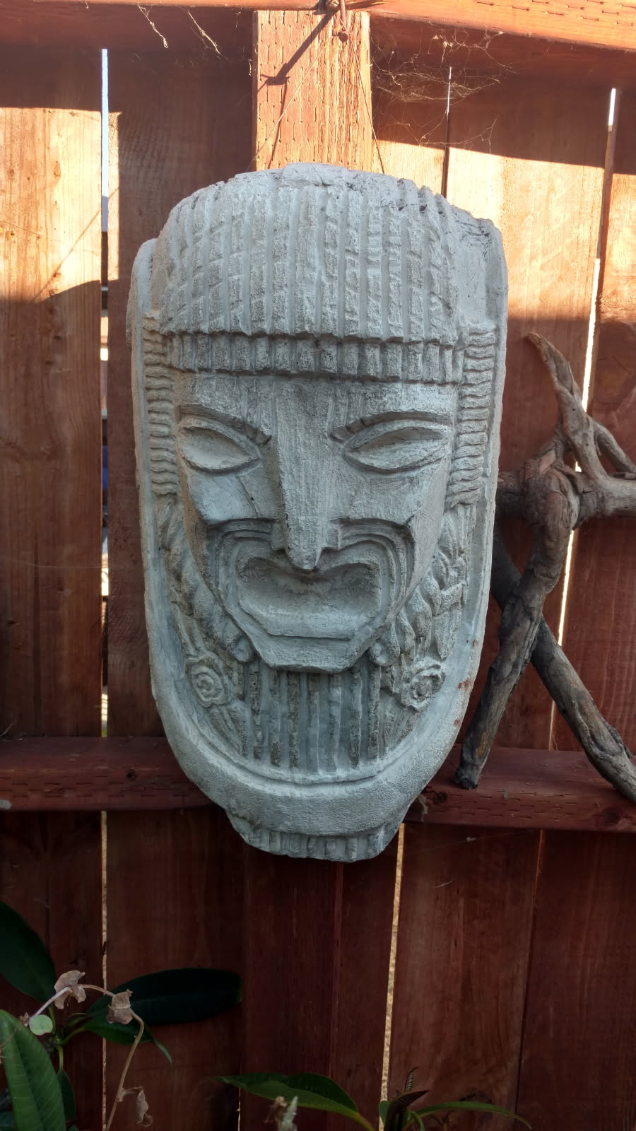 Untitled — Carved Stone-Style Mask (title to be confirmed)